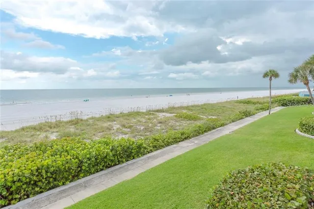 a view of a lake with a big yard