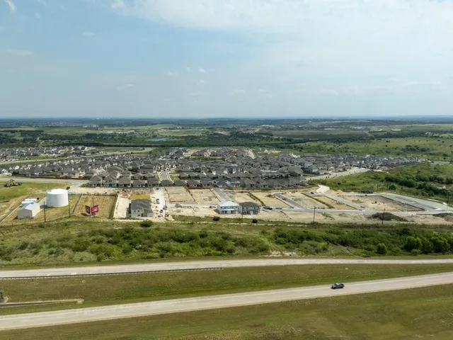 a view of a swimming pool and an ocean view