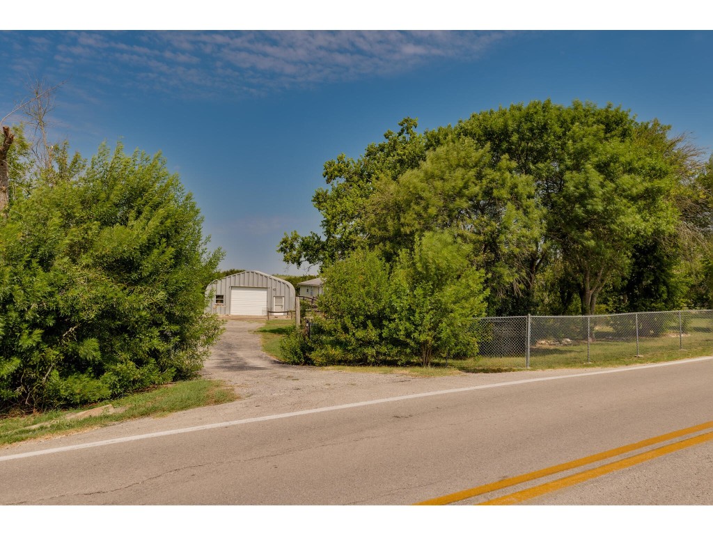 13506 Palmer Road Buda, TX 78610 - Photo 17 of 33 a view of a field with a tree
