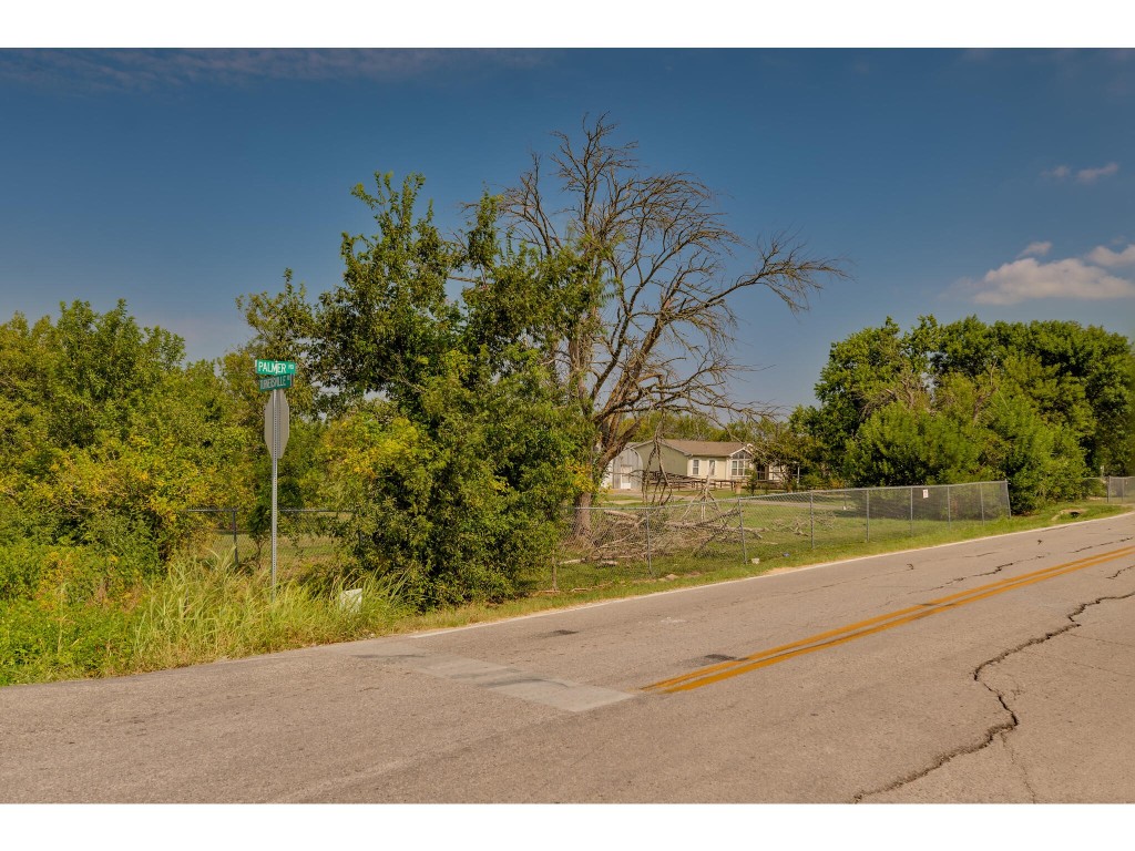 13506 Palmer Road Buda, TX 78610 - Photo 18 of 33 a view of a yard with an outdoor space
