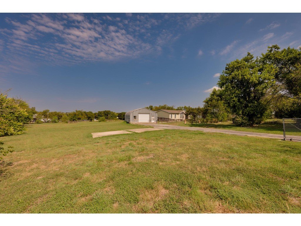 13506 Palmer Road Buda, TX 78610 - Photo 19 of 33 a view of an ocean and beach