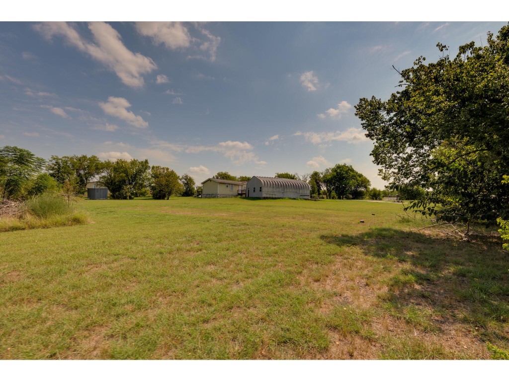 13506 Palmer Road Buda, TX 78610 - Photo 22 of 33 a view of an ocean and beach