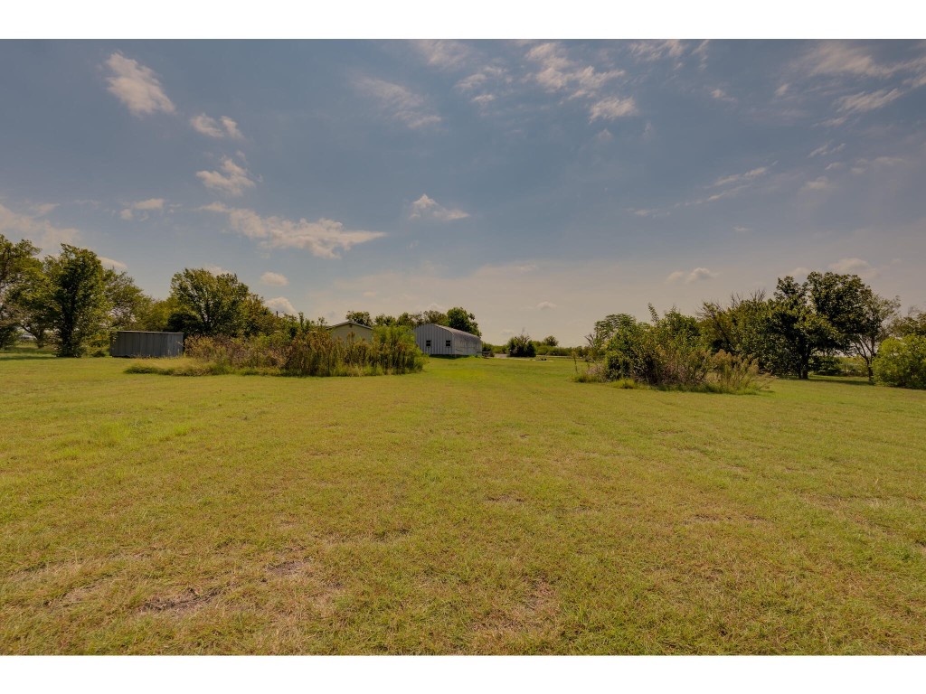 13506 Palmer Road Buda, TX 78610 - Photo 24 of 33 a view of an ocean and beach