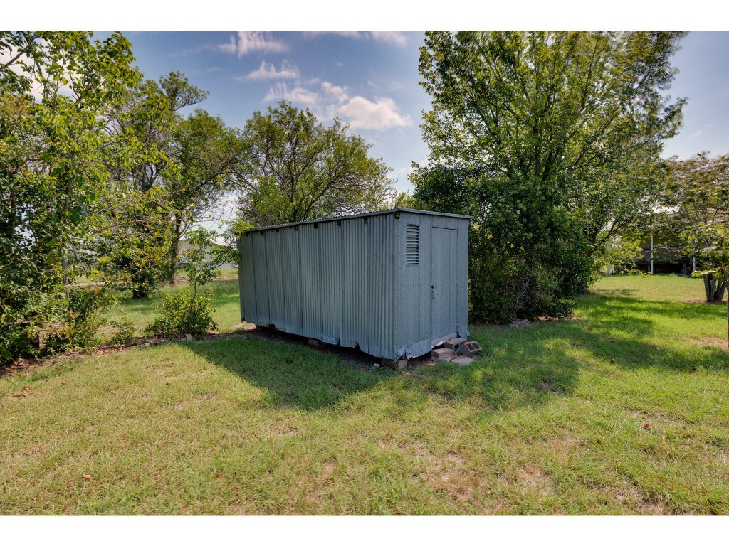 13506 Palmer Road Buda, TX 78610 - Photo 26 of 33 a view of backyard with green space