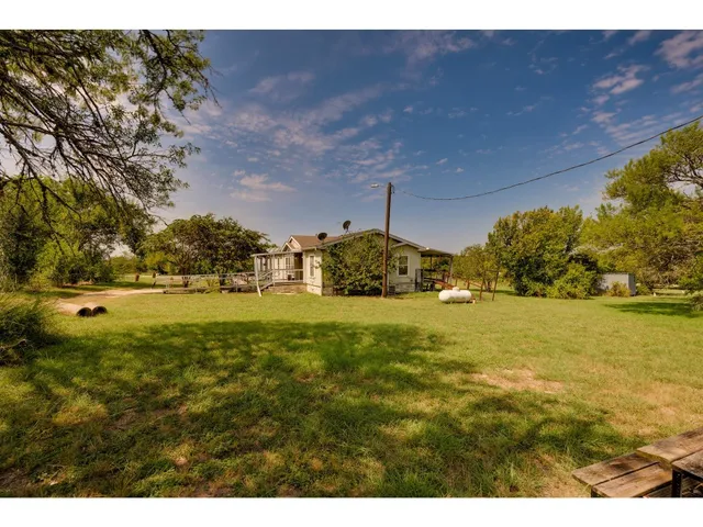 a view of outdoor space and yard