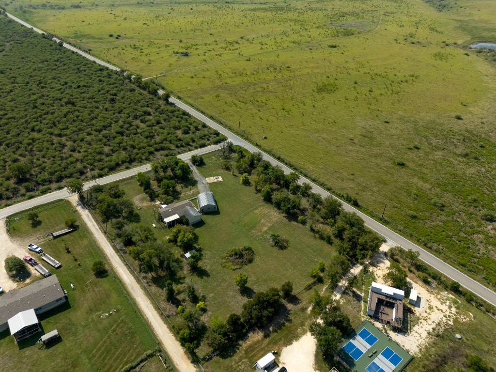 13506 Palmer Road Buda, TX 78610 - Photo 8 of 33 a view of a yard