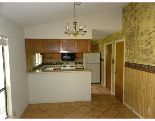 a view of a kitchen with a sink
