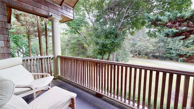 a view of a two chairs in the roof deck