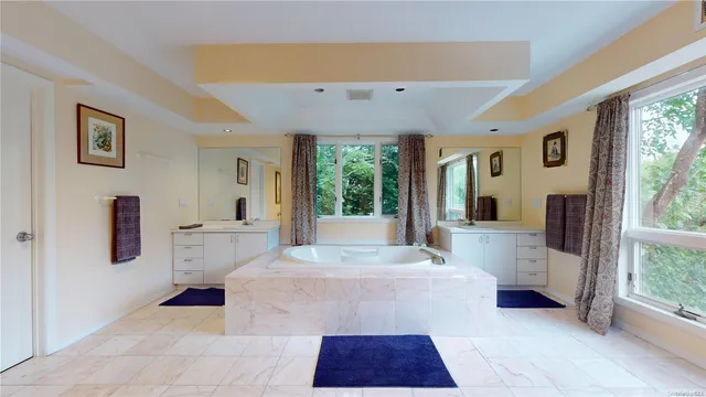 a large white room with a large window