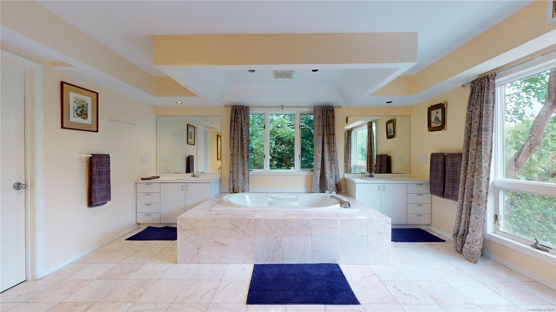 28 Club Lane Remsenburg, NY 11960 - Photo 23 of 33 a large white room with a large window