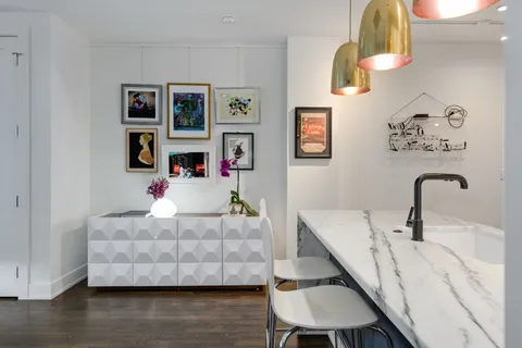 a living room with furniture and window