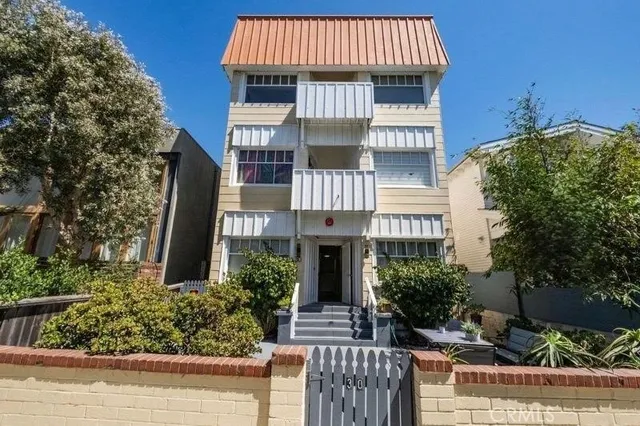 front view of a house with a small yard