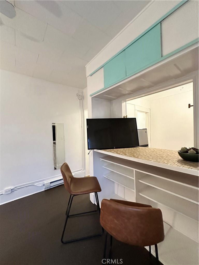 30 Dudley Avenue, Unit 6 Venice, CA 90291 - Photo 16 of 19 a living room with furniture and a flat screen tv