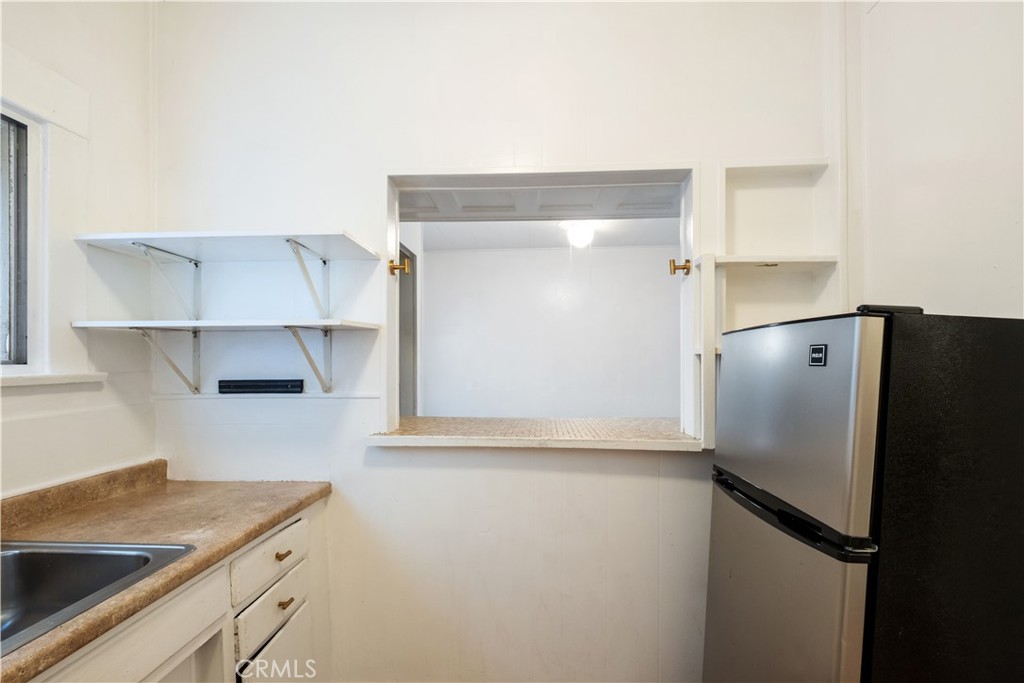 30 Dudley Avenue, Unit 6 Venice, CA 90291 - Photo 8 of 19 a kitchen with a refrigerator and a sink