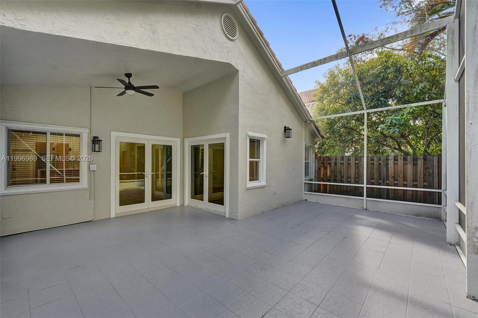 10153 Northwest 3rd Court Plantation, FL 33324 - Photo 73 of 82 an empty room with windows