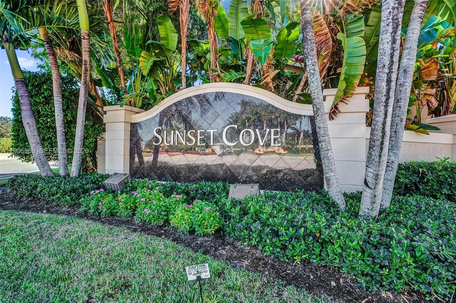 10153 Northwest 3rd Court Plantation, FL 33324 - Photo 82 of 82 a view of a street sign under a large tree