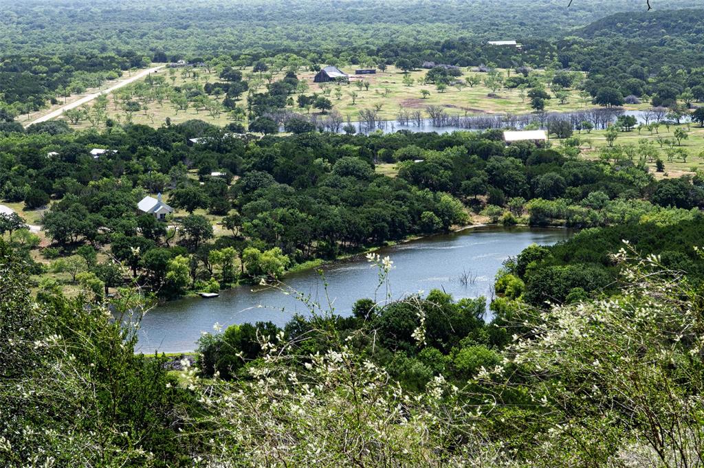 235 Big Bear Loop Strawn, TX 76475 - Photo 2 of 40 an aerial view of residential houses with outdoor space and trees