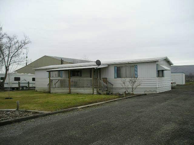 6510 Postma Road Yakima, WA 98901 - Photo 1 of 4 a view of a house with a outdoor space