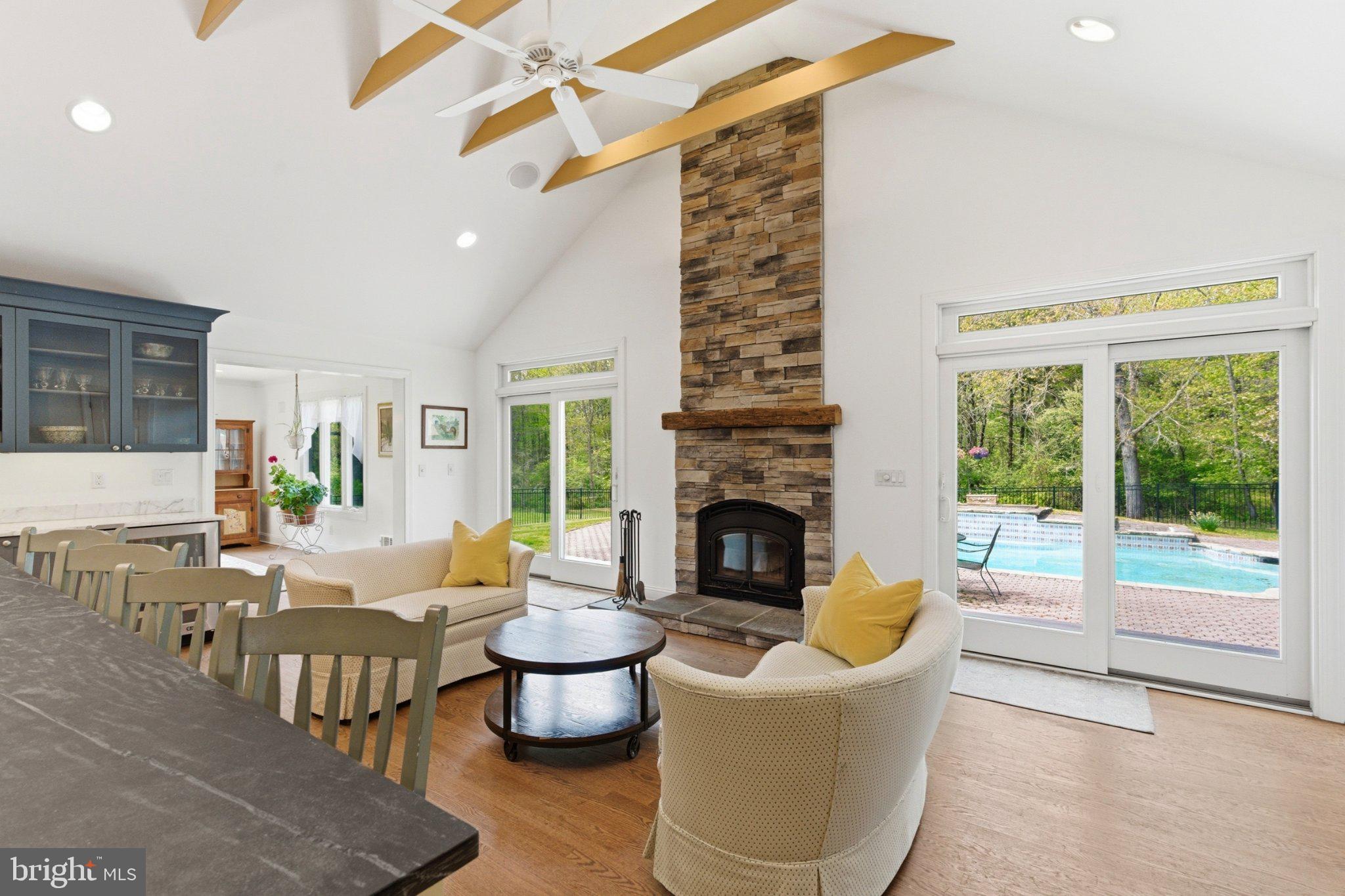 112 Stony Brook Road Hopewell, NJ 08525 - Photo 19 of 69 Vaulted ceiling with beams and sliders to the pool