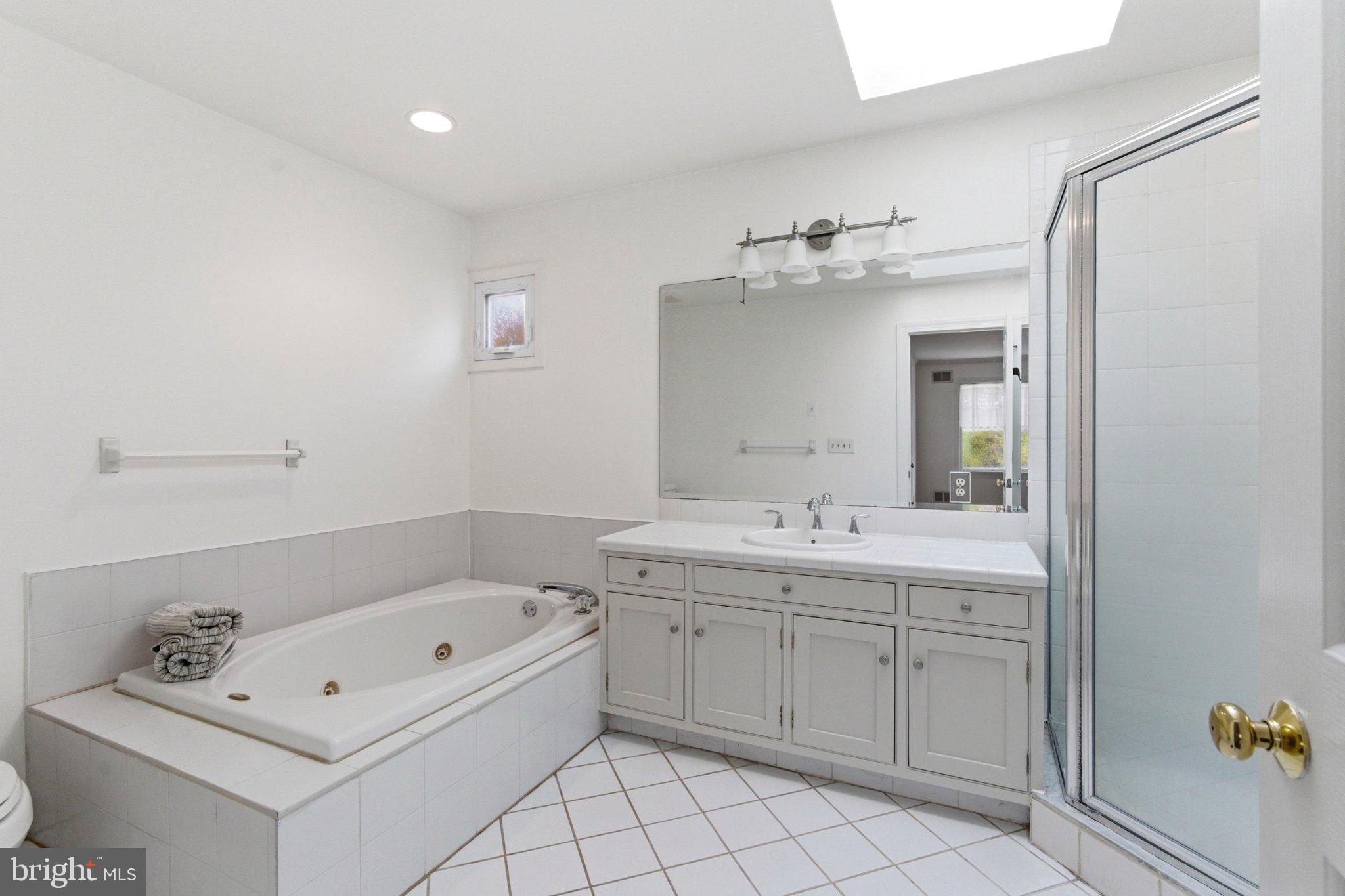 112 Stony Brook Road Hopewell, NJ 08525 - Photo 25 of 69 Serene spa-like primary bathroom with jetted tub.