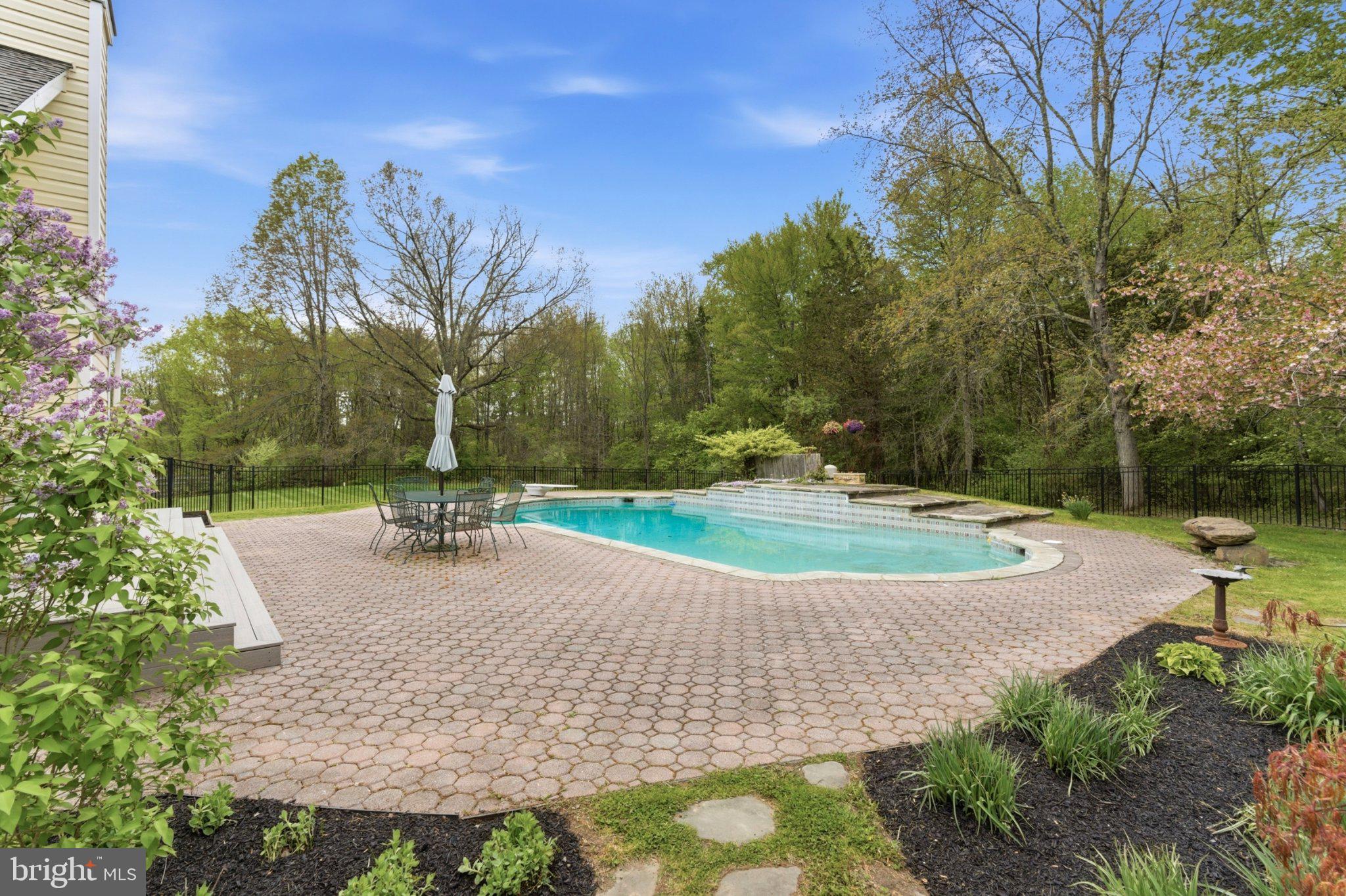 112 Stony Brook Road Hopewell, NJ 08525 - Photo 39 of 69 The pool setting is both tranquil and inviting