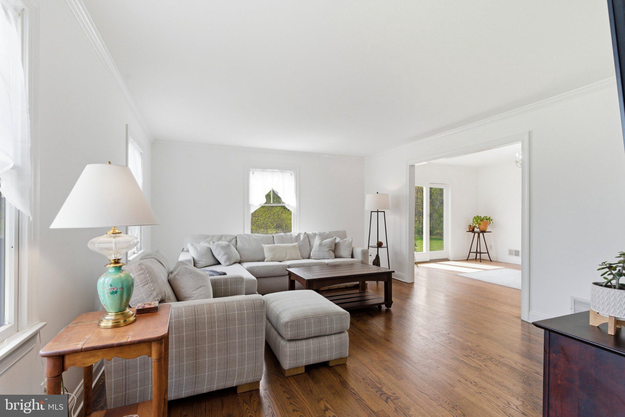 112 Stony Brook Road Hopewell, NJ 08525 - Photo 7 of 69 Living room opens to a sitting room.