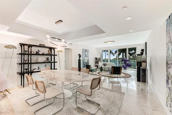 a view of a living room and dining room