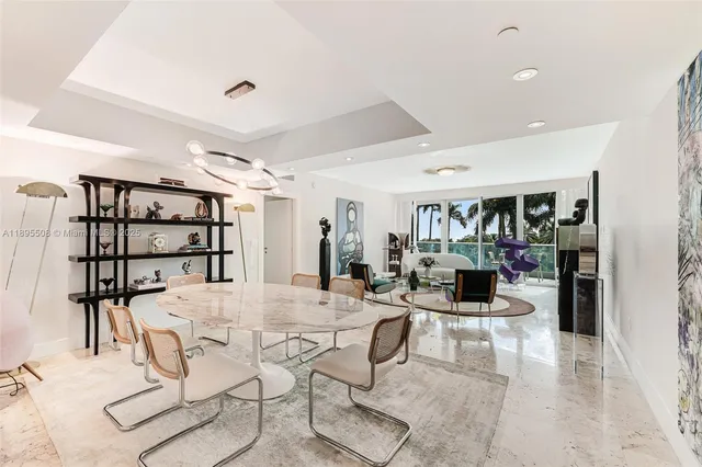 a view of a living room and dining room