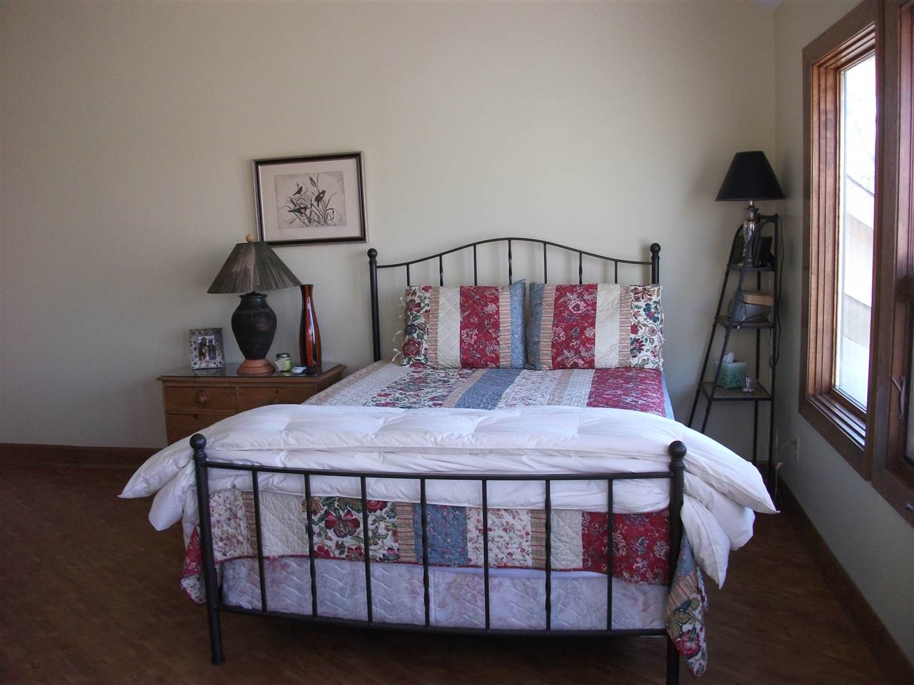 200 Eagle View Drive Cherokee, AL 35616 - Photo 12 of 34 a bedroom with a bed a window and dresser