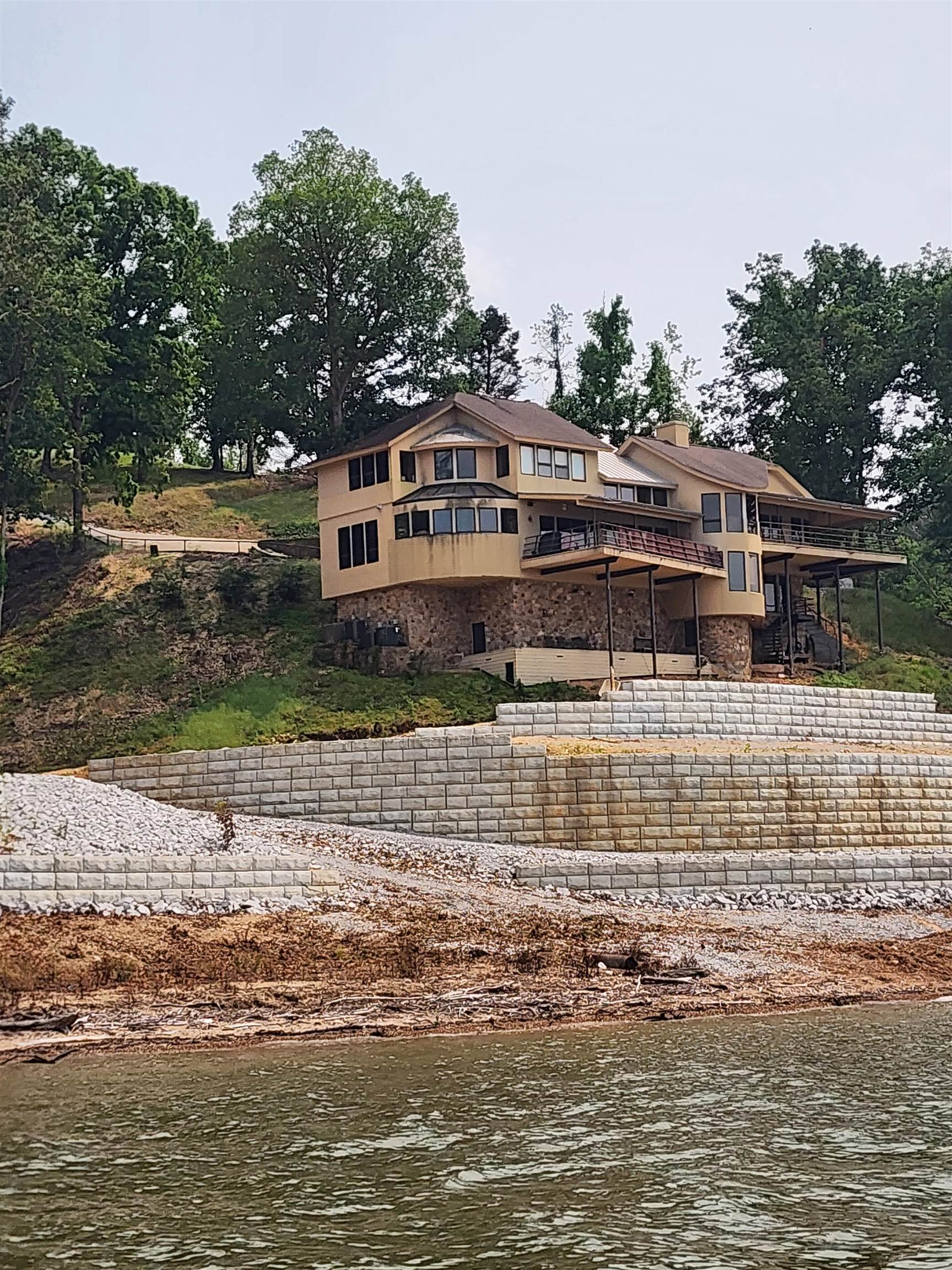 200 Eagle View Drive Cherokee, AL 35616 - Photo 27 of 34 a front view of a house with a ocean view