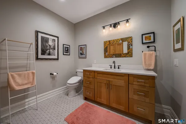 a room with wooden floor and furniture