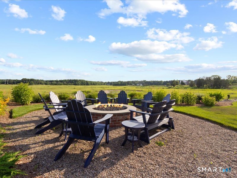 66 High Street, Unit 34 Guilford, CT 06437 - Photo 35 of 39 Gas fire pit overlooking the marsh