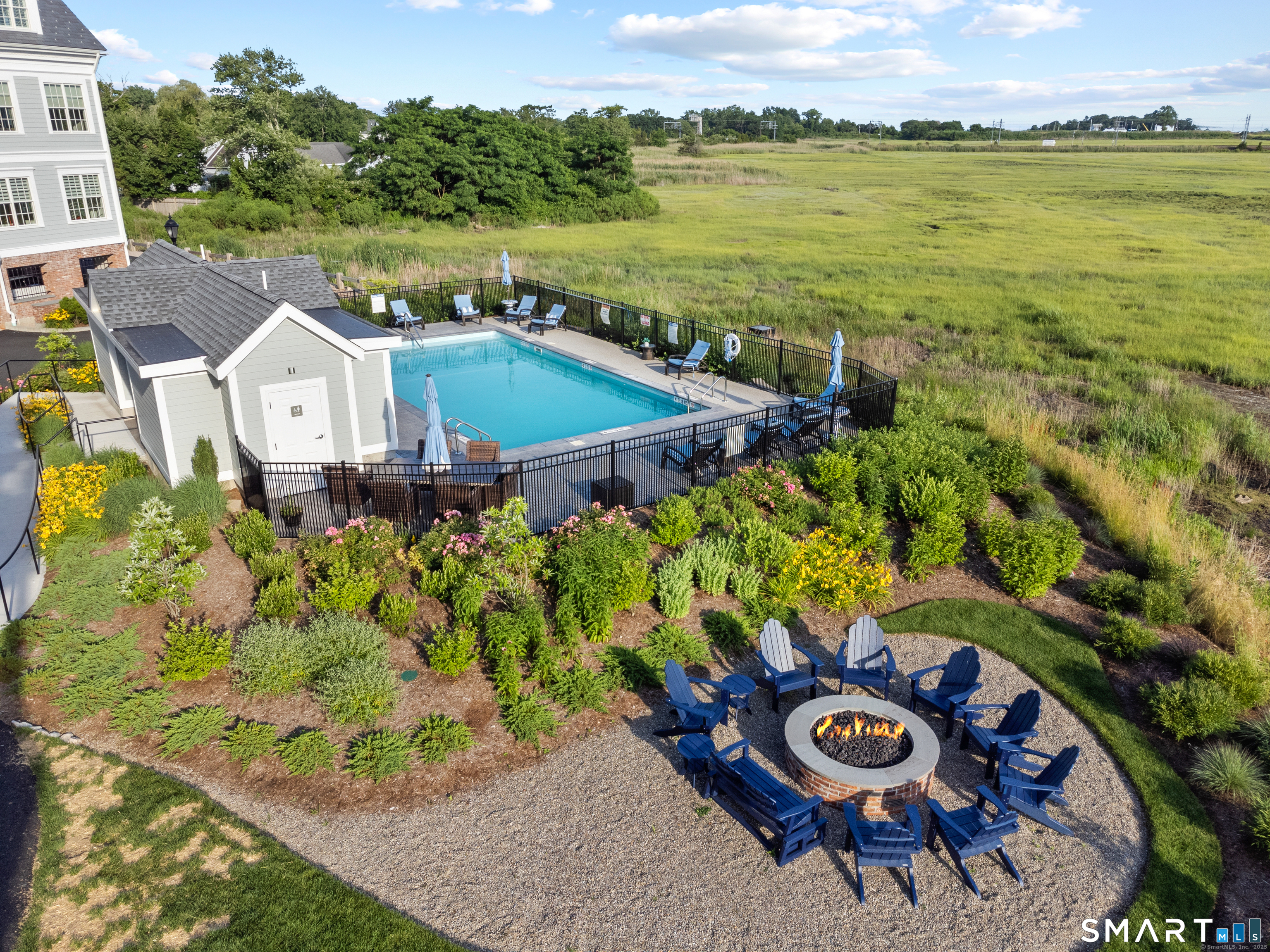 66 High Street, Unit 34 Guilford, CT 06437 - Photo 35 of 40 an aerial view of a house with a ocean view