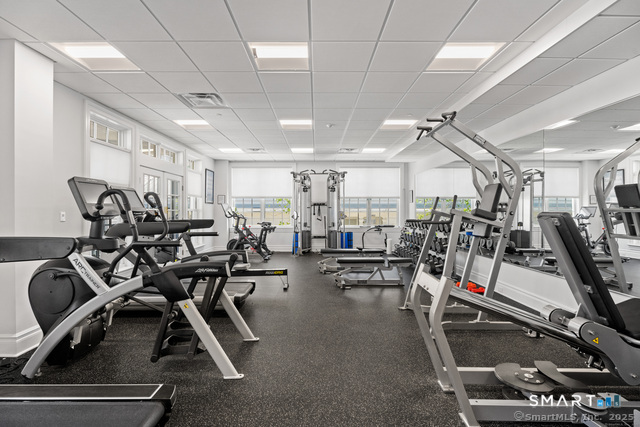66 High Street, Unit 34 Guilford, CT 06437 - Photo 38 of 40 a view of a room with gym equipment