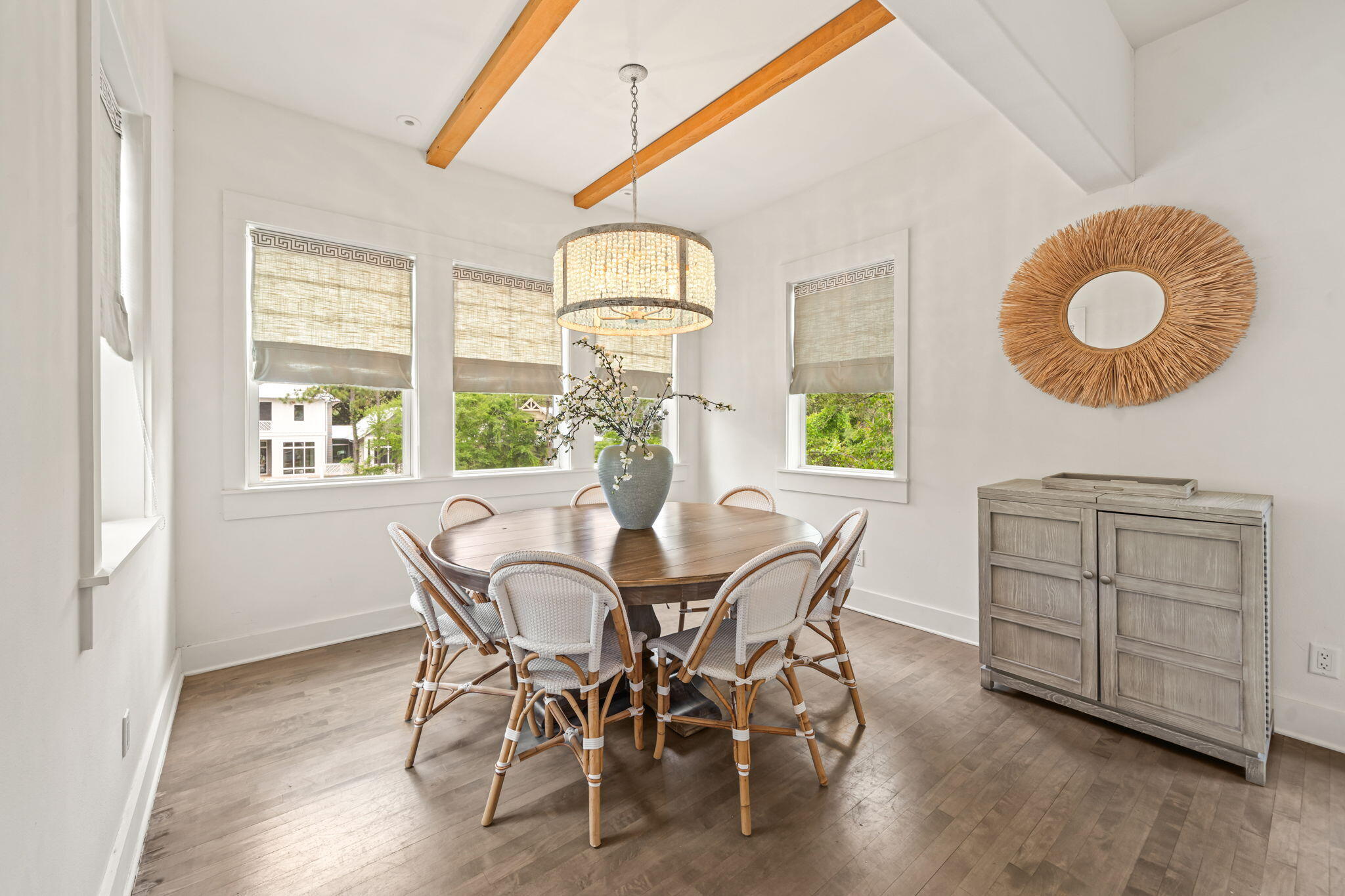 353 Wilderness Way Santa Rosa Beach, FL 32459 - Photo 11 of 50 a view of a dining room with furniture and a window