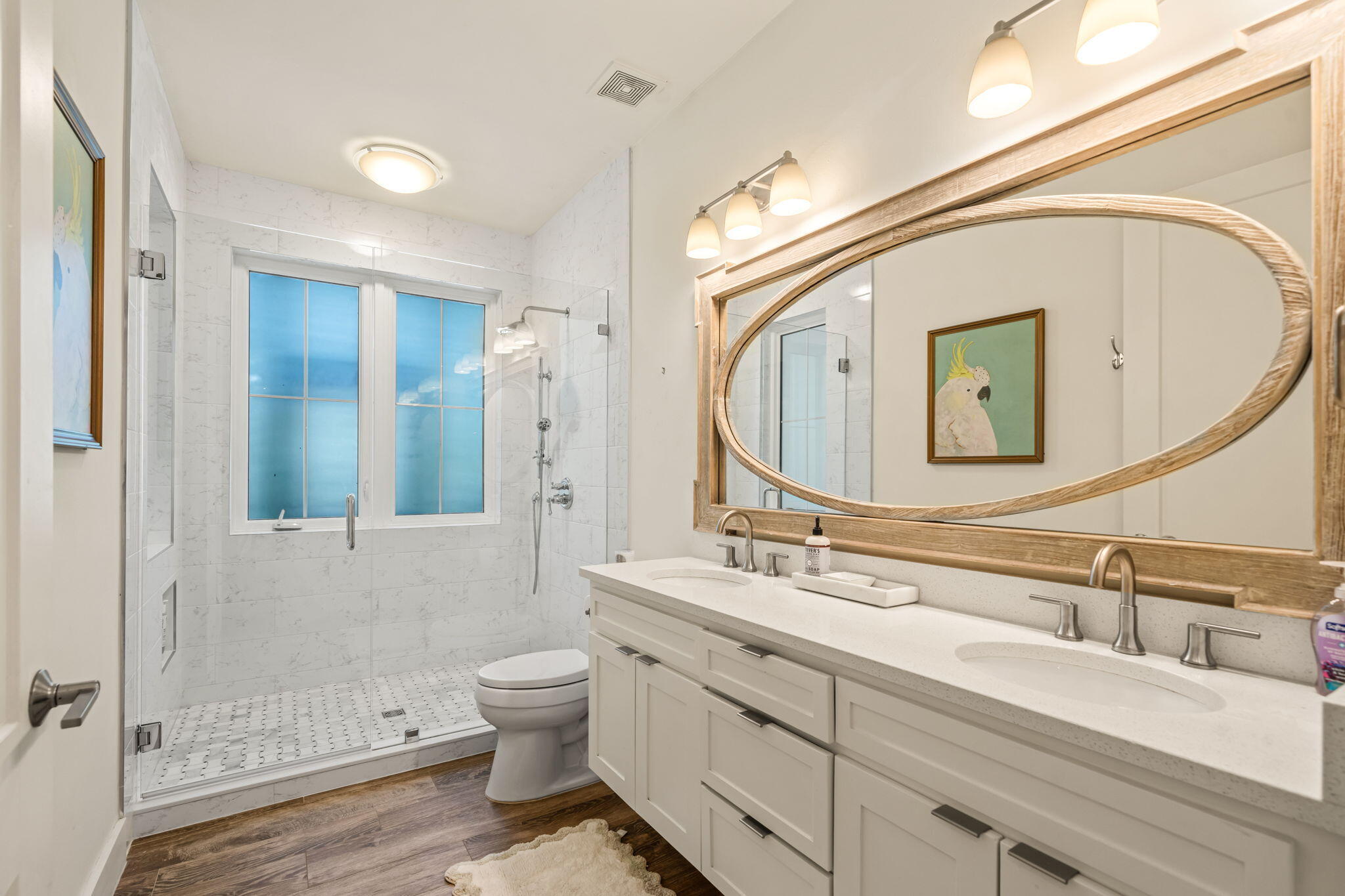 353 Wilderness Way Santa Rosa Beach, FL 32459 - Photo 28 of 50 a bathroom with a double vanity sink and a mirror