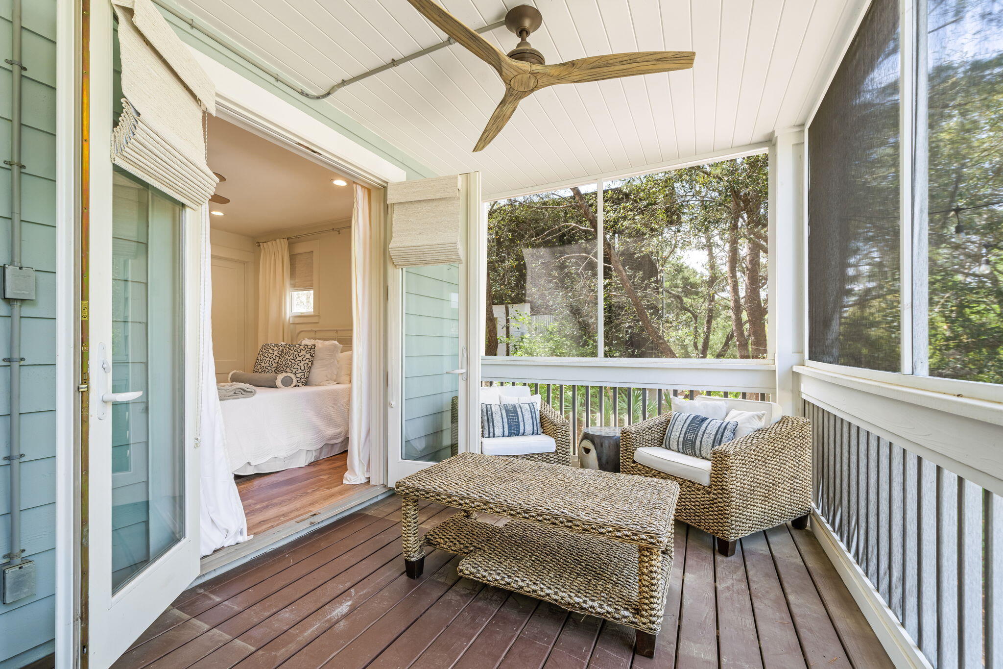 353 Wilderness Way Santa Rosa Beach, FL 32459 - Photo 31 of 50 a bedroom with a bed and wooden floor