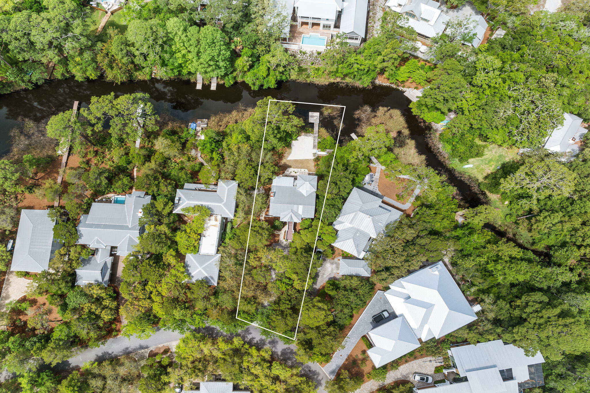 353 Wilderness Way Santa Rosa Beach, FL 32459 - Photo 50 of 50 an aerial view of residential house with outdoor space and trees all around