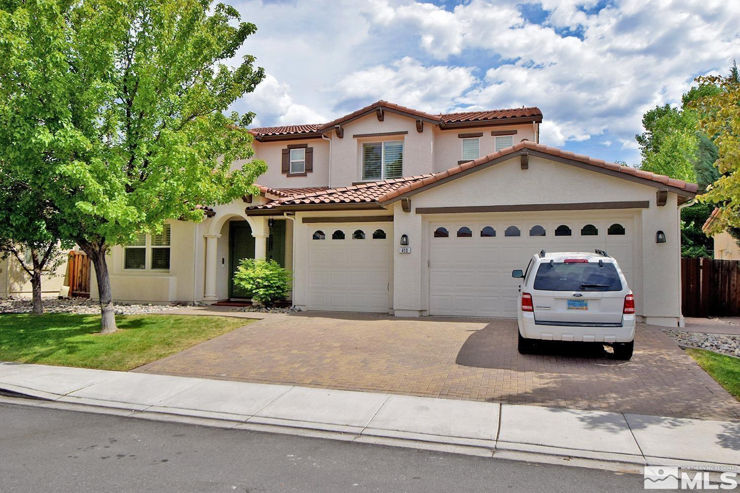 410 Teramo Court Reno, NV 89521 - Photo 1 of 32 a car parked in front of a house