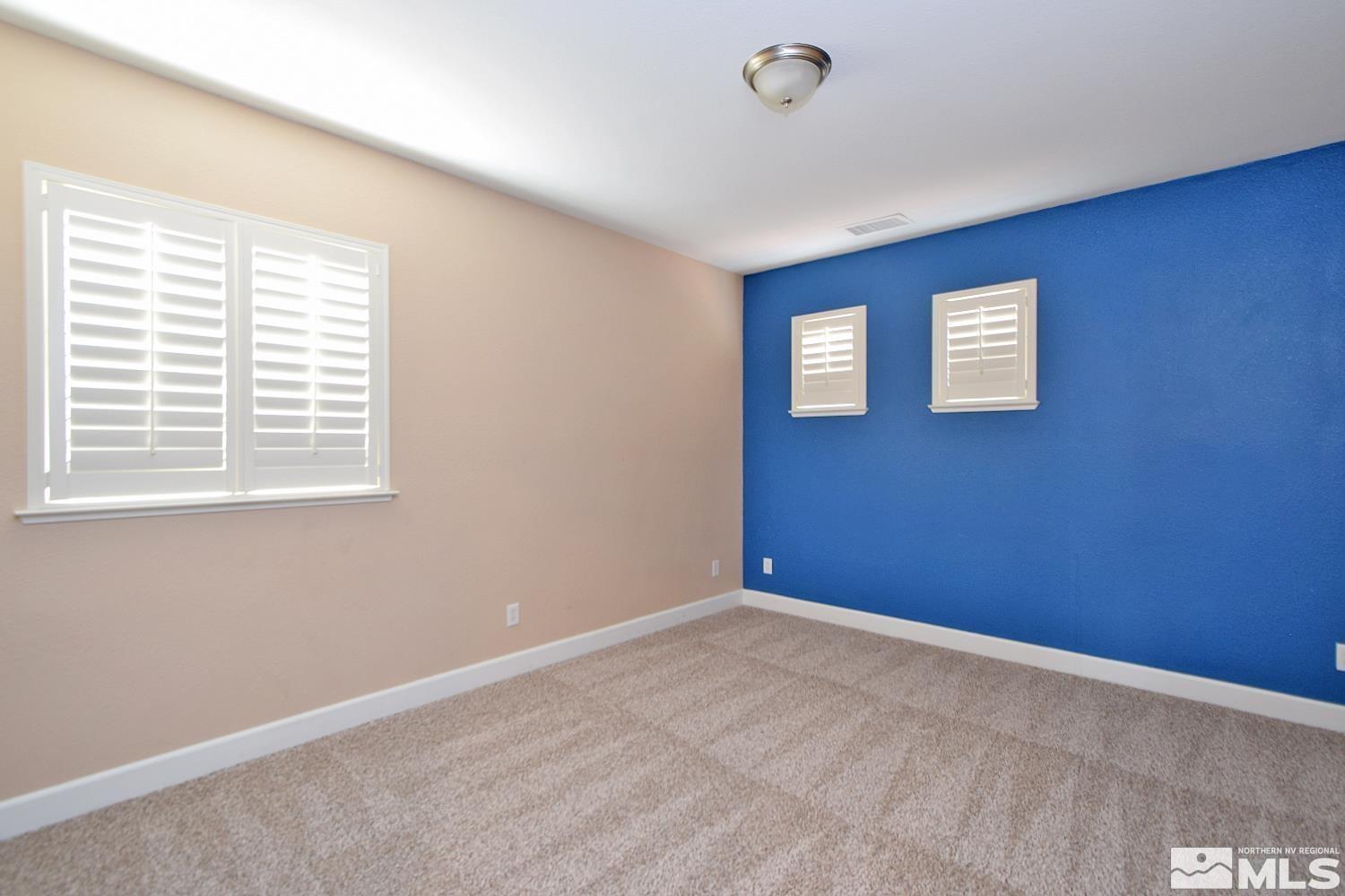 410 Teramo Court Reno, NV 89521 - Photo 15 of 32 a view of an empty room with a window