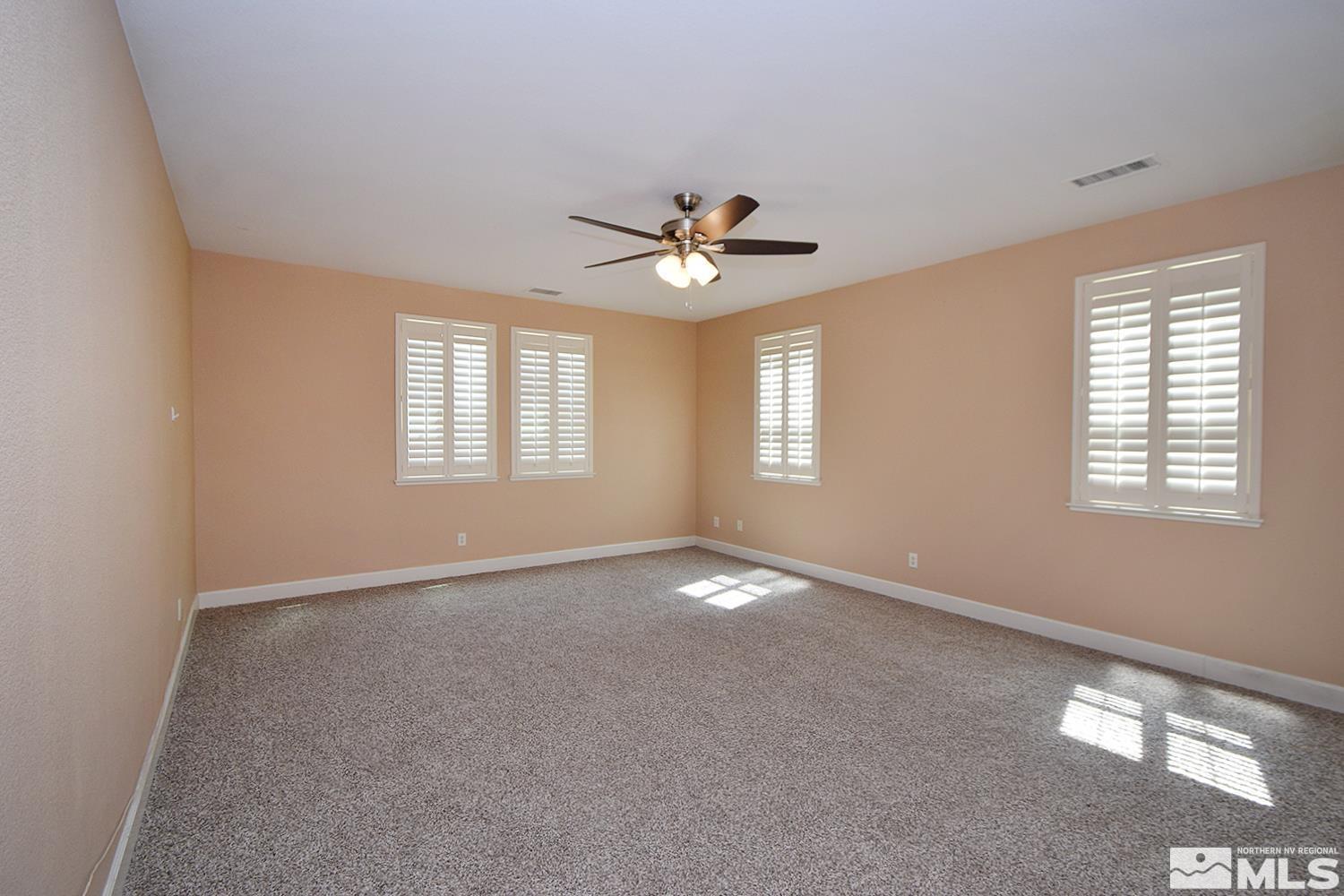 410 Teramo Court Reno, NV 89521 - Photo 26 of 32 a view of an empty room with a window