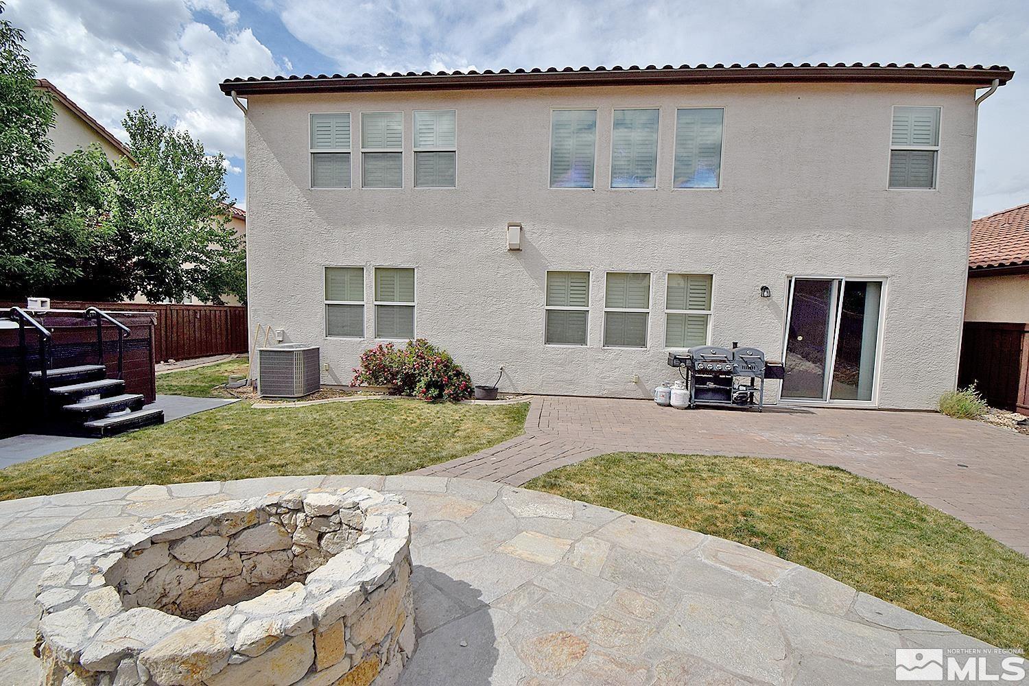 410 Teramo Court Reno, NV 89521 - Photo 29 of 32 a view of a house with back yard