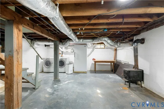 a front view of a building with trees