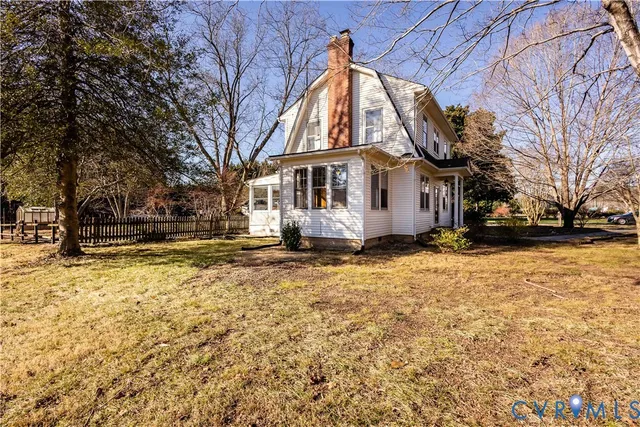 a backyard of a house with lots of green space