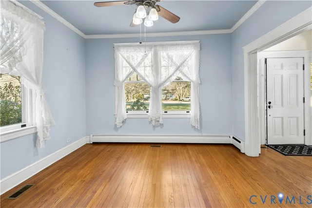 a kitchen with granite countertop a sink a stove and cabinets