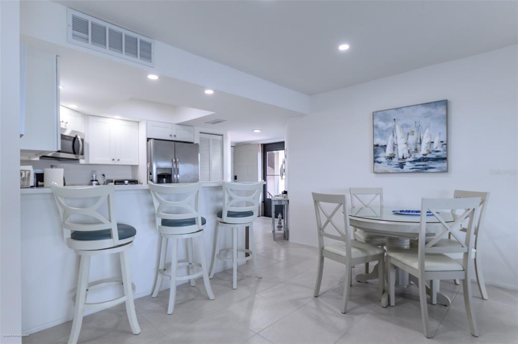 2601 West Marion Avenue, Unit 41C Punta Gorda, FL 33950 - Photo 14 of 43 a view of a dining room with furniture