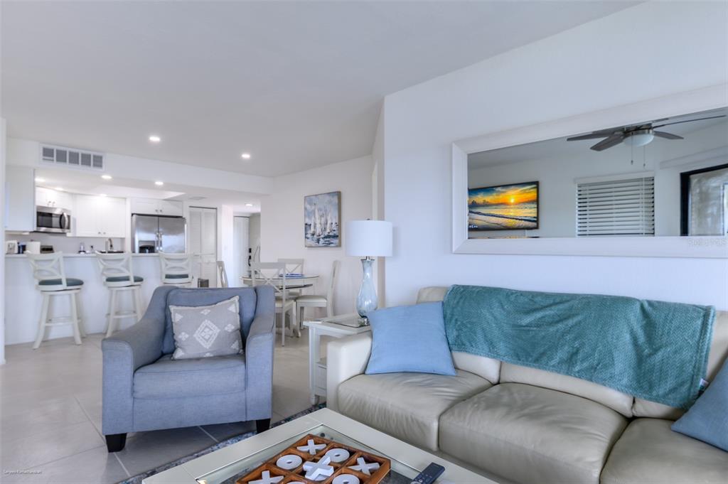 2601 West Marion Avenue, Unit 41C Punta Gorda, FL 33950 - Photo 17 of 43 a living room with furniture and kitchen view