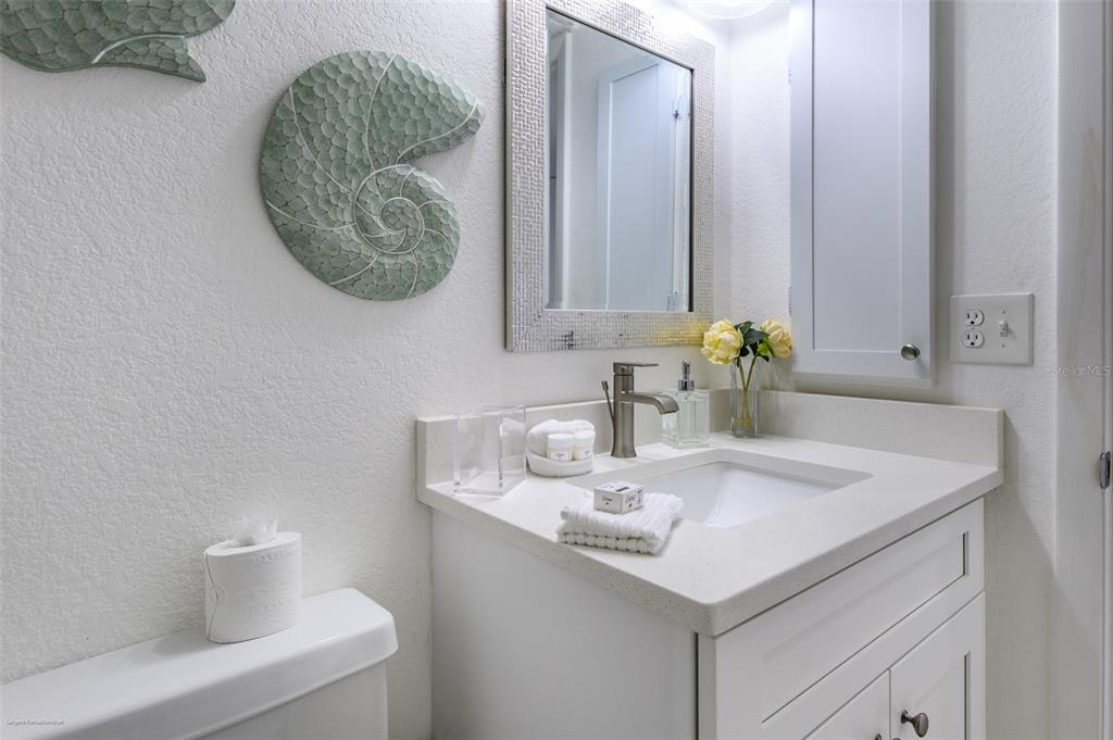 2601 West Marion Avenue, Unit 41C Punta Gorda, FL 33950 - Photo 33 of 43 a bathroom with a sink and a mirror