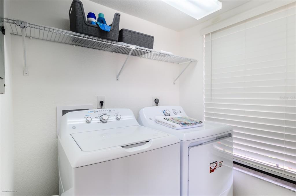 2601 West Marion Avenue, Unit 41C Punta Gorda, FL 33950 - Photo 40 of 43 a utility room with dryer and washer