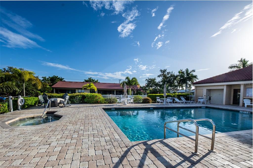 2601 West Marion Avenue, Unit 41C Punta Gorda, FL 33950 - Photo 43 of 43 a view of a swimming pool with a patio